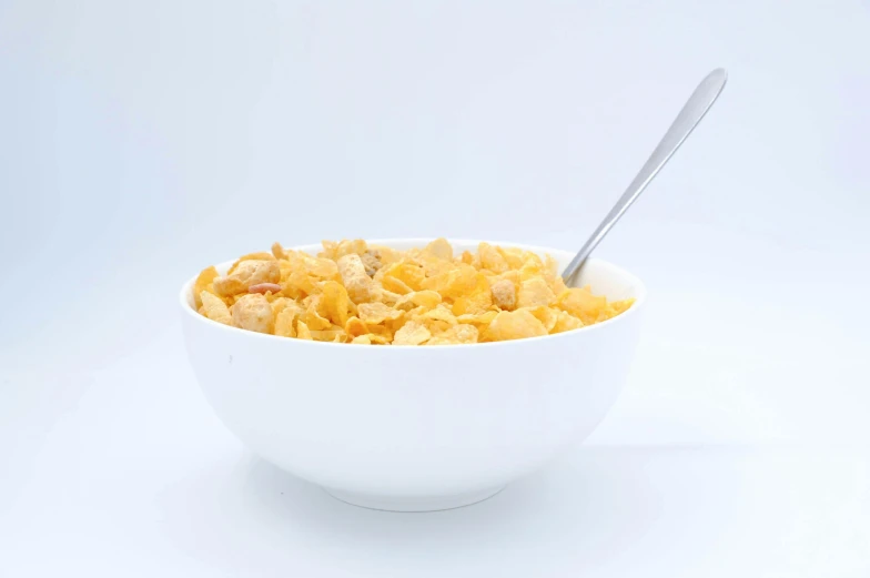 a bowl of cereal with a spoon in it, white backdrop, detailed product image, crisp lighting, ultra high detail