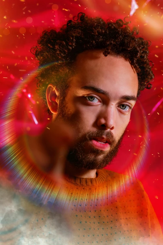 a man with a beard standing in front of a red background, inspired by David LaChapelle, eyes are rainbow spirals, mixed race, promotional image, ringflash lighting