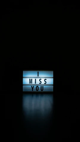 a light up sign that says i miss you, minimalism, high-quality photo, thumbnail, lightbox, dark. no text