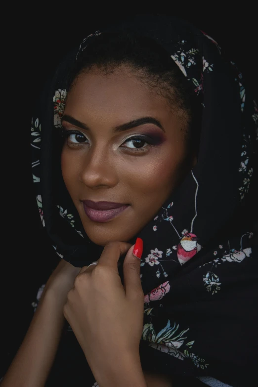 a close up of a person wearing a headscarf, black eyeshadow, ( ( dark skin ) ), casual pose, shot with sony alpha