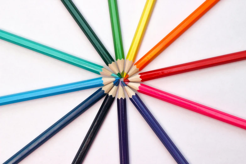 a group of colored pencils arranged in a circle, inspired by Damien Hirst, pexels, ilustration, !pencil, rainbow coloured rockets, colouring pages