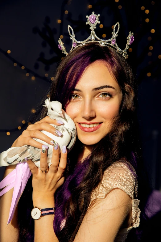 a close up of a person holding a bird, a colorized photo, inspired by Julia Pishtar, shutterstock contest winner, wearing tiara, jessica nigri, white and purple, the woman holds more toys