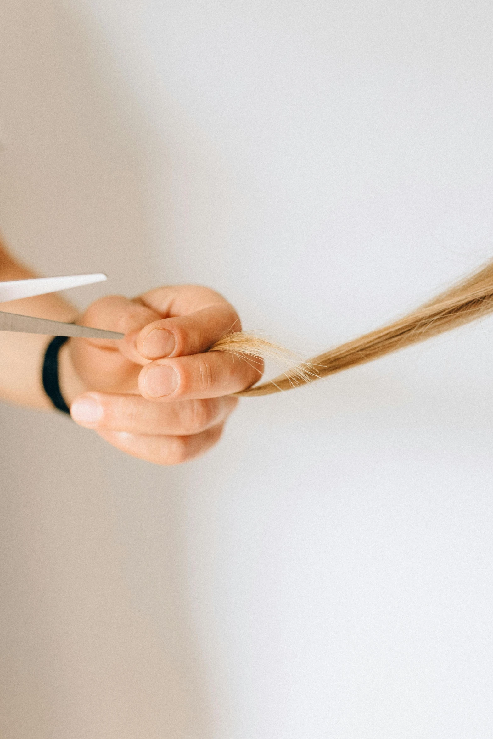 a woman cutting her hair with a pair of scissors, pexels contest winner, renaissance, close up to a skinny, clean minimalist design, weave, blonde crea