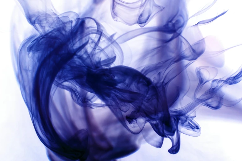 a close up of blue smoke on a white background, inspired by Yves Klein, pexels, lyrical abstraction, second colours - purple, spiraling, floating in perfume, ink and muted colours on silk