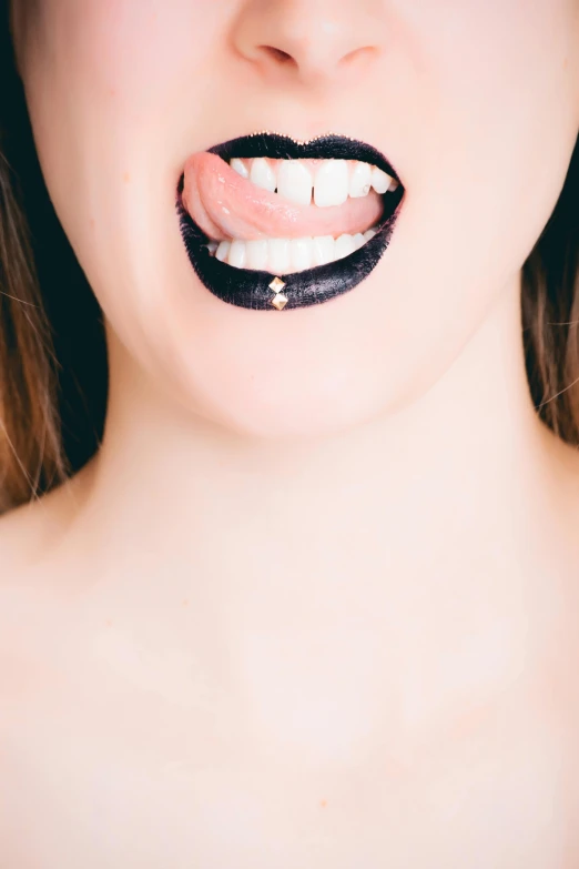 a close up of a woman with her mouth open, inspired by Hedi Xandt, trending on pexels, faint smile dark lipstick, about to consume you, smiling maniacally, bubble goth