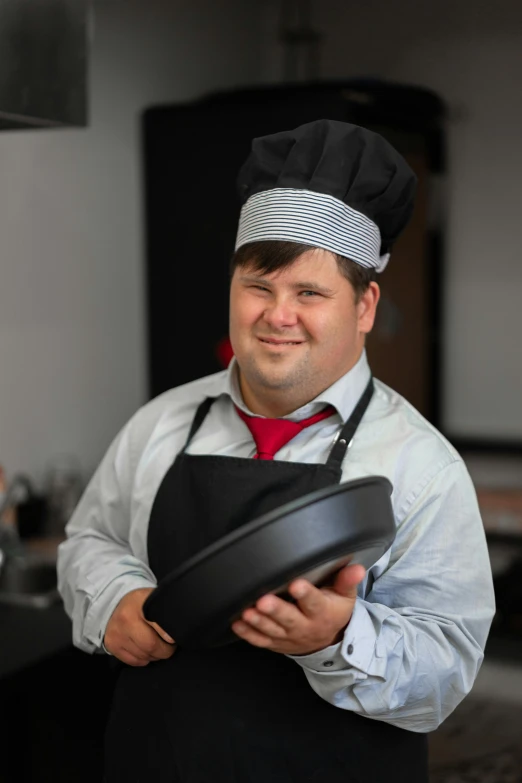 a man in a chef's hat holding a frying pan, trending on reddit, andy milonakis, high quality photo, obese ), confident expression
