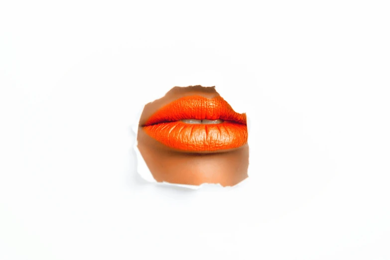 an orange lip sticking out of a hole in a piece of paper, trending on pexels, pop art, shiny skin, french kiss, with a white background, orange skin. intricate