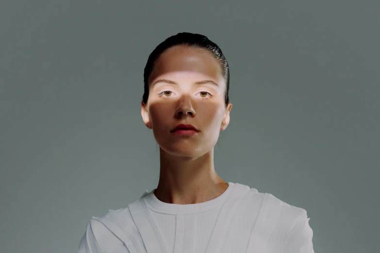 a close up of a person wearing a white shirt, a hologram, inspired by Fei Danxu, perfectly lit face, mariko mori, intrecate light, nadav kander
