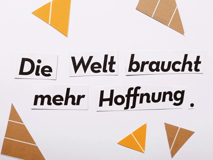 a sign that says die welt braucht ner hoffung, by Helmut Federle, trending on unsplash, arbeitsrat für kunst, knolling, yellow calibri font, etsy stickers, dunce