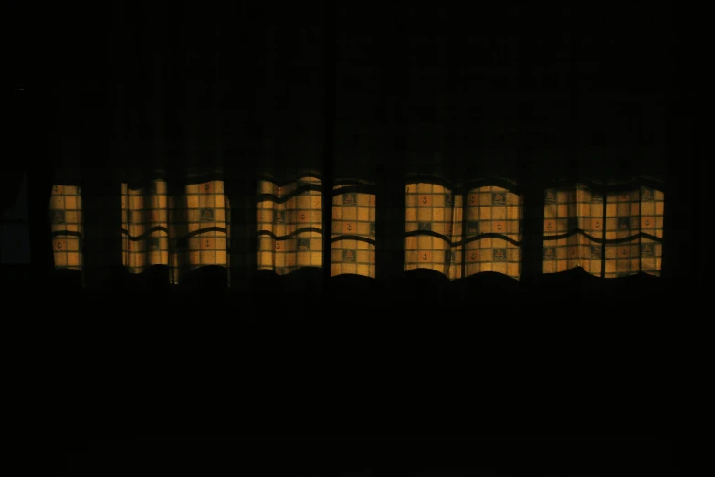 the sun shining through a window in a dark room, inspired by Andreas Gursky, in a row, nighttime scene, drapes, lined up horizontally