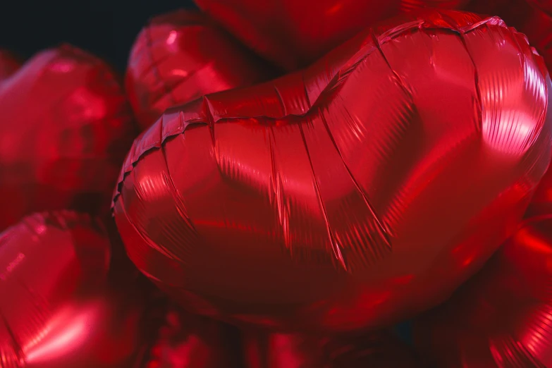 a bunch of red balloons in the shape of a heart, pexels contest winner, hyperrealism, foil effect, substance designer metal, pbr materials, cinematic close shot