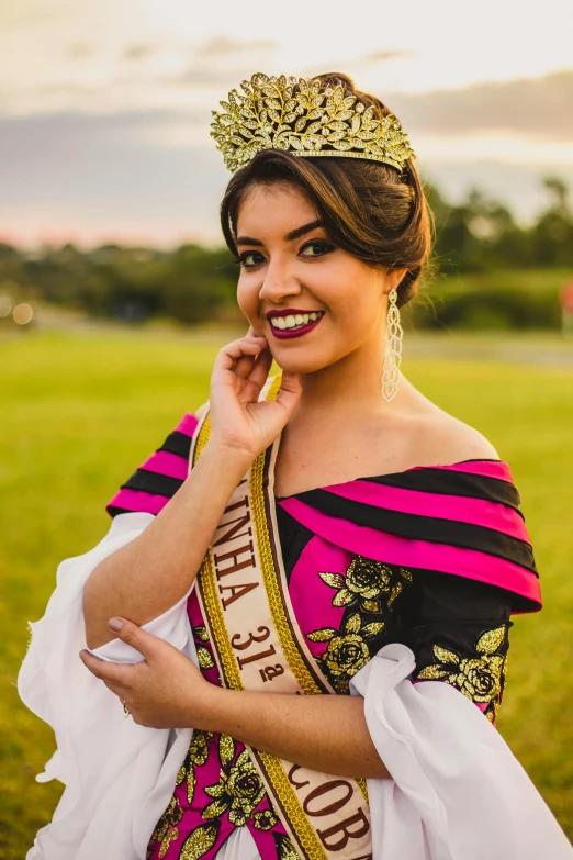 a woman wearing a crown standing in a field, latinas, black and yellow and red scheme, formal wear, manuka