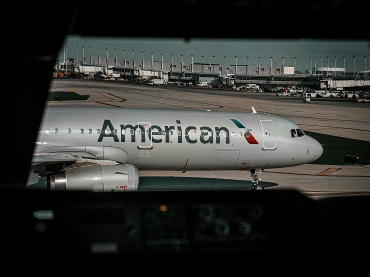 a large jetliner sitting on top of an airport tarmac, pexels contest winner, american realism, in cockpit, american progress, instagram post, a green