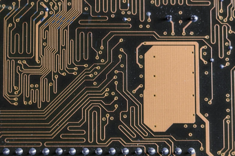 a close up of a printed circuit board, by Carey Morris, pixabay, black and gold wires, instagram post, brown, laser cut