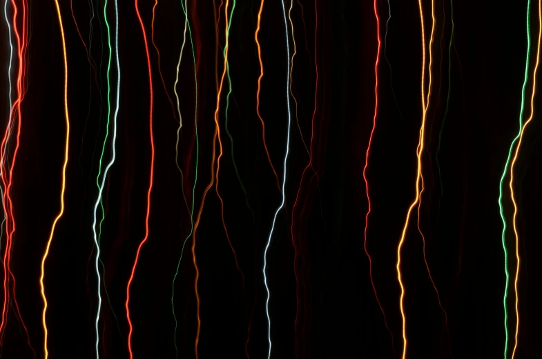 a bunch of lights that are in the dark, an album cover, pexels, lyrical abstraction, very elongated lines, multicoloured, very vascular, electrical signals