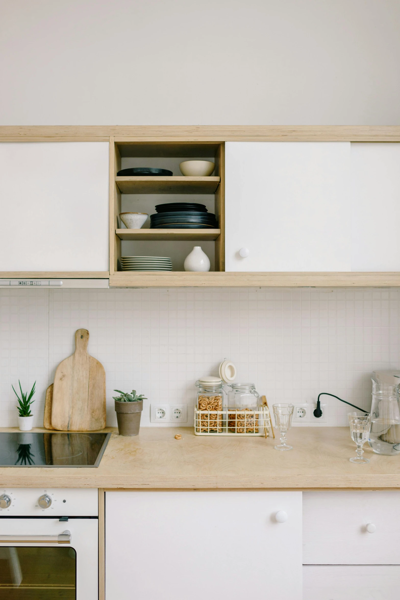 the kitchen is clean and ready for us to use, unsplash, modernism, vanilla, square, small in size, kacper niepokolczycki