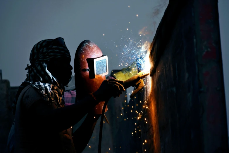 a person that is welding some kind of thing, a portrait, pexels contest winner, arbeitsrat für kunst, profile image, islamic, avatar image, rectangle