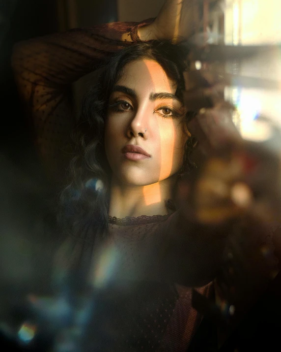 a woman taking a picture of herself in a mirror, inspired by Elsa Bleda, pexels contest winner, art photography, middle eastern skin, window light, portrait androgynous girl, lensflare