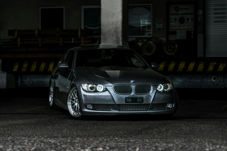 a car parked in a parking lot at night, pexels contest winner, renaissance, bmw, long front end, desaturated!!, full daylight