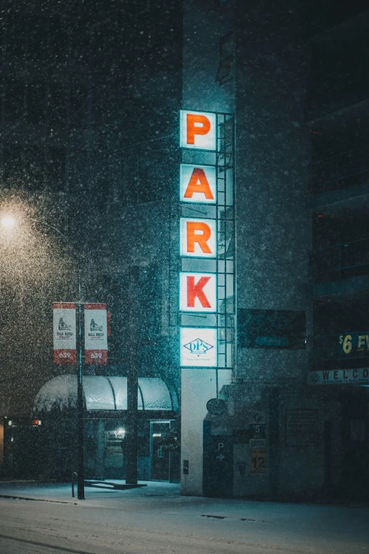 a car parked on the side of the road in the snow, poster art, by Adam Rex, unsplash contest winner, graffiti, city at night in the rain, sangyeob park, bright signage, parks