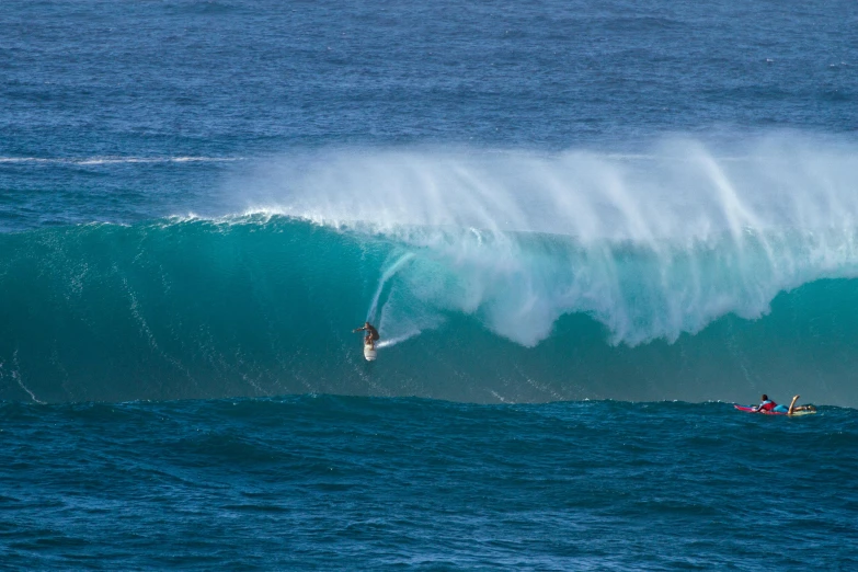 a man riding a wave on top of a surfboard, pexels contest winner, renaissance, kauai, massive scale, near his barrel home, blue