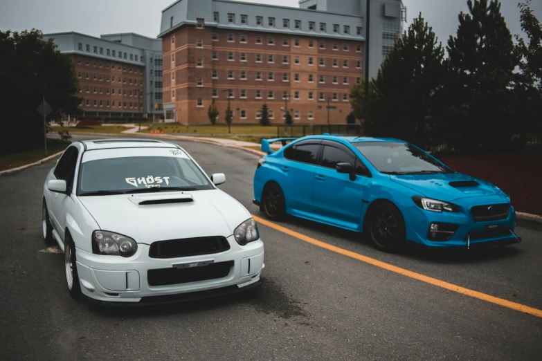 two cars parked next to each other in front of a building, inspired by An Gyeon, unsplash, avatar image, rally car, ghost, subaru