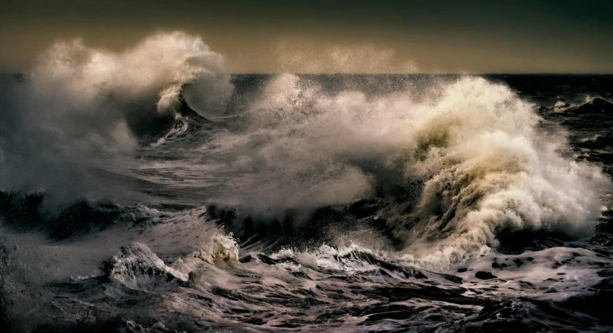 a large wave in the middle of a body of water, a photorealistic painting, by Brian Thomas, pexels contest winner, vorticism, sepia photography, apocalyptic tumultuous sea, deep colour, shoreline