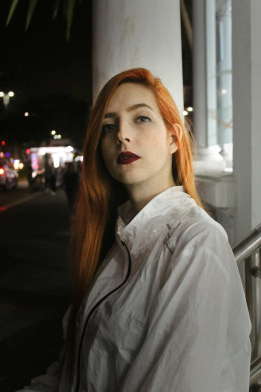 a woman with red hair standing in front of a building, inspired by Elsa Bleda, unsplash, hyperrealism, in front of a black background, androgynous person, long orange hair, an all white human