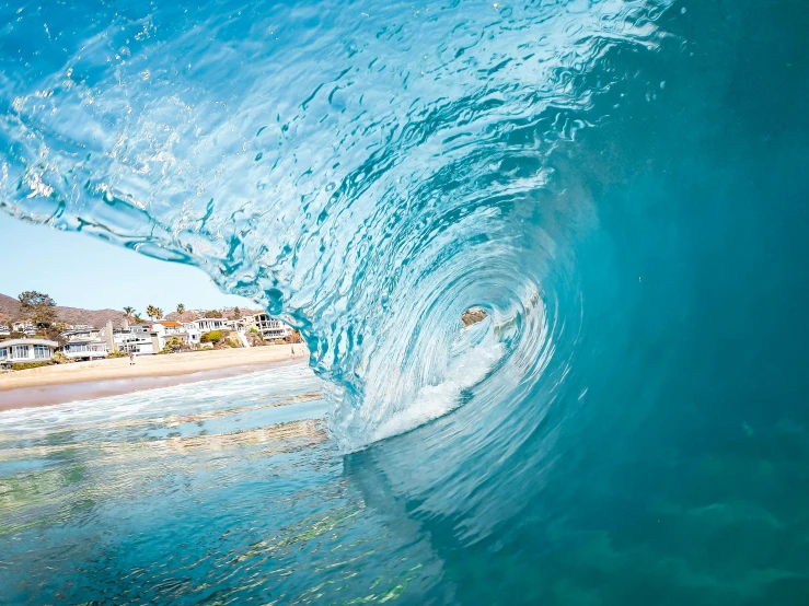 a man riding a wave on top of a surfboard, by Drew Tucker, unsplash contest winner, looking through a portal, crystal clear blue water, o'neill cylinder colony, ultrawide lens”