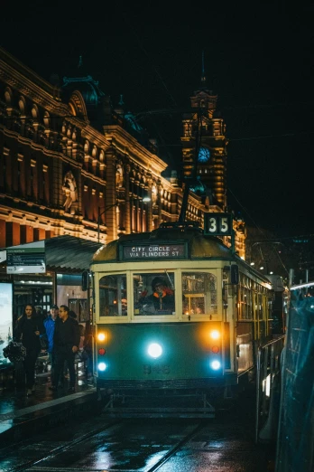 a trolley on a city street at night, by Anita Malfatti, pexels contest winner, art nouveau, north melbourne street, brown, square, thumbnail