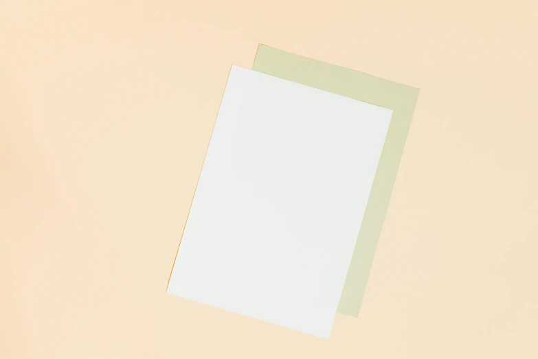 a piece of paper sitting on top of a table, pale green background, card template, two - tone, minimal art