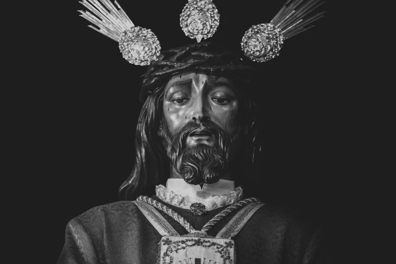 a black and white photo of a statue of jesus, pexels, baroque, crown made of fabric, style of santiago caruso, monochrome 3 d model, roman catholic icon