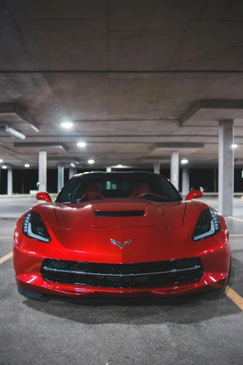 a red sports car parked in a parking garage, a portrait, pexels contest winner, stingray, front flash, instagram picture, 15081959 21121991 01012000 4k