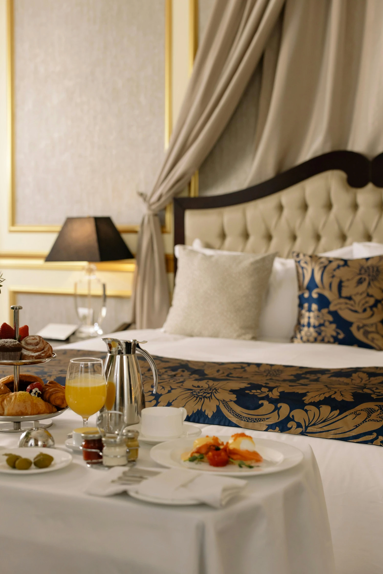 a bed room with a neatly made bed and a tray of food, inspired by Frederick Goodall, baroque, breakfast buffet, honeycomb halls, kazakh empress, award - winning crisp details ”