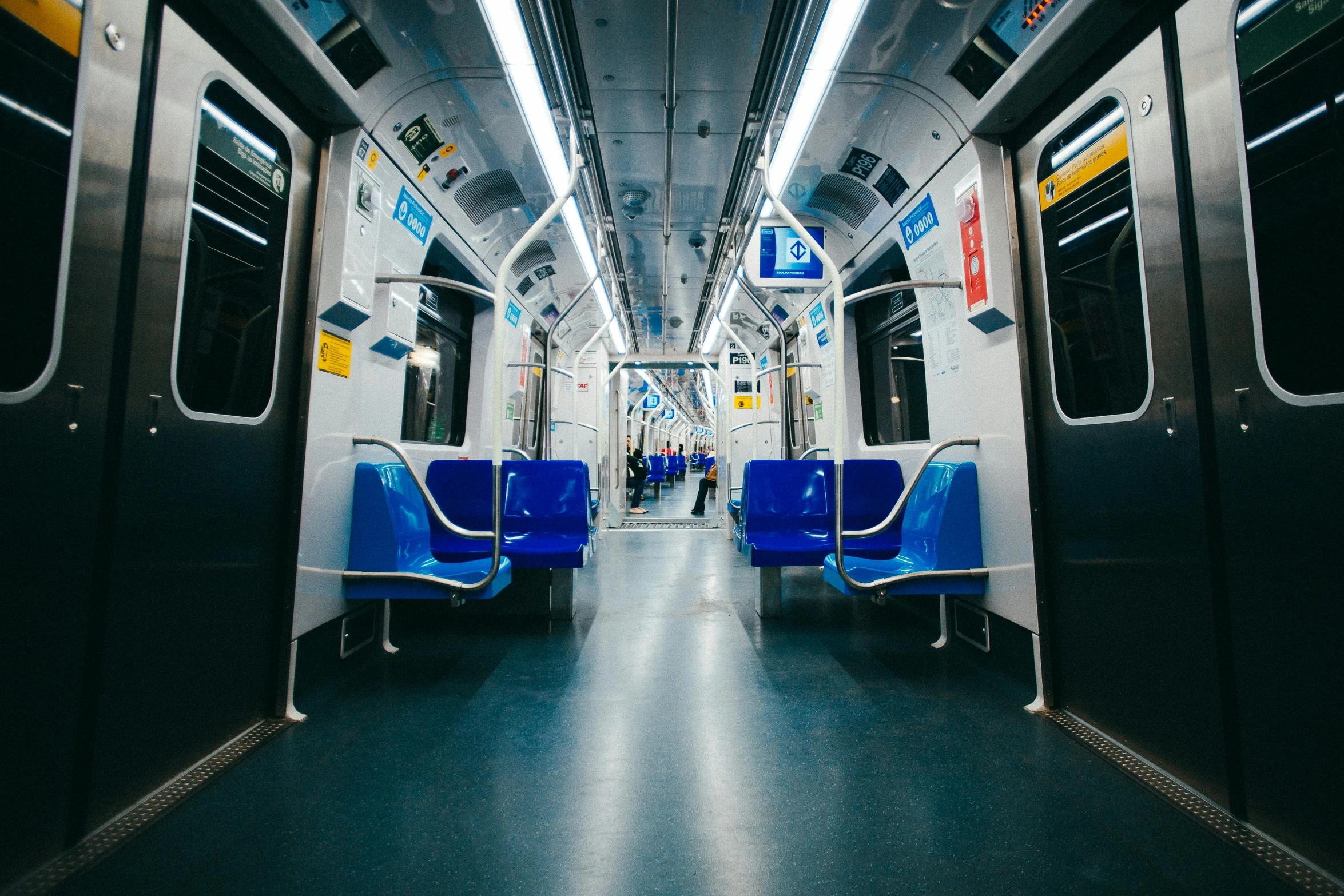 the inside of a subway car with blue seats, a picture, unsplash contest winner, worksafe. instagram photo, buenos aires, plain stretching into distance, 🚿🗝📝