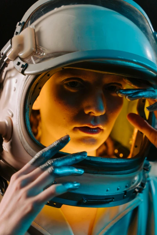 a woman in a space suit talking on a cell phone, pexels contest winner, fantastic realism, movie scene portrait closeup, inquisitive, perfectly lit. movie still, galaxy reflected in helmet