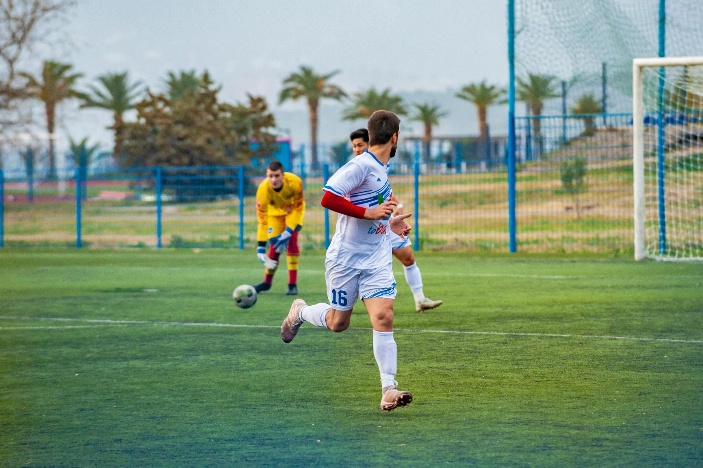 a group of young men playing a game of soccer, trending on dribble, amr elshamy, 8k photo, wearing a school soccer uniform, 15081959 21121991 01012000 4k