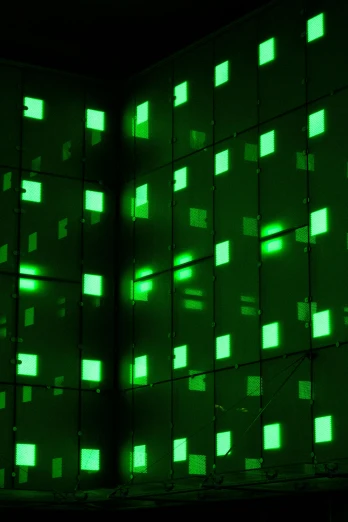 a room filled with lots of green squares, a hologram, inspired by Bruce Nauman, flickr, partylights, inside a tall vetical room, deep green, high quality photo