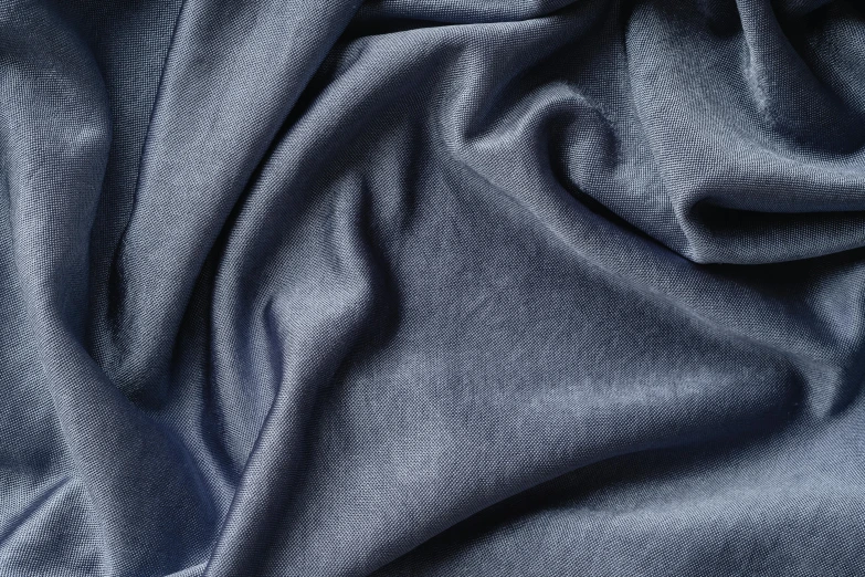 a close up of a blue fabric, inspired by Cleve Gray, unsplash, renaissance, gun metal grey, moonlight grey, velvet, thumbnail