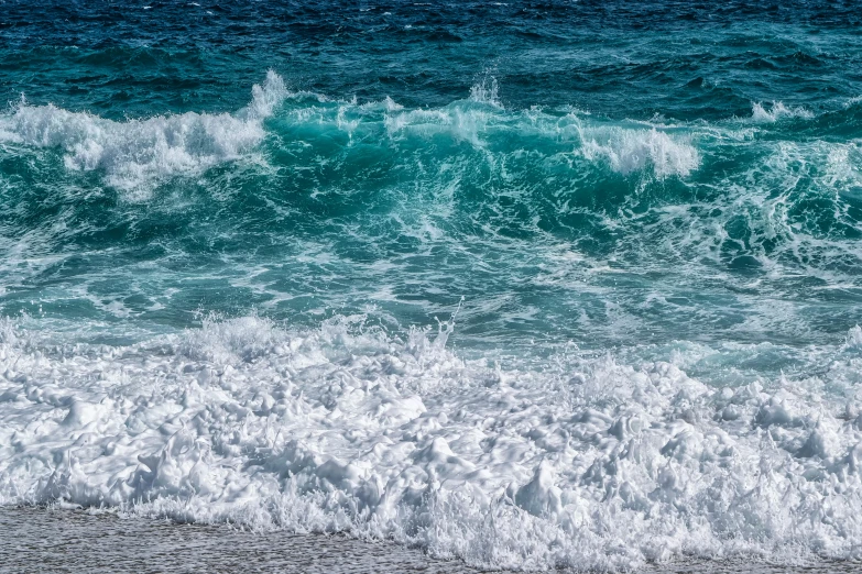 a person riding a surfboard on top of a wave, pexels, fine art, azure waves of water, glistening seafoam, shoreline, mediterranean