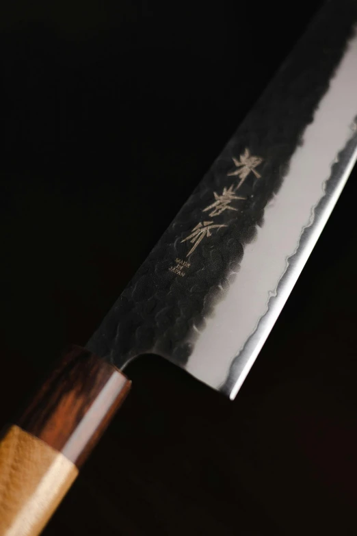 a close up of a knife on a table, shin hanga, detailed product image