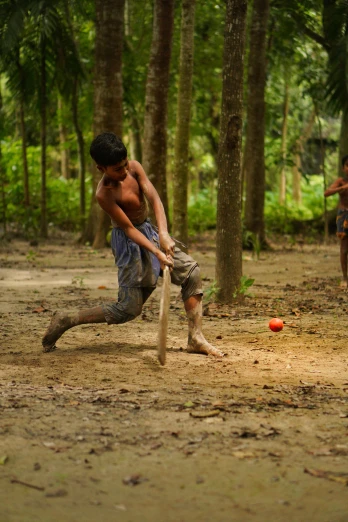 a group of young men playing a game of baseball, sumatraism, slide show, on a jungle forest, more, single bangla farmer fighting
