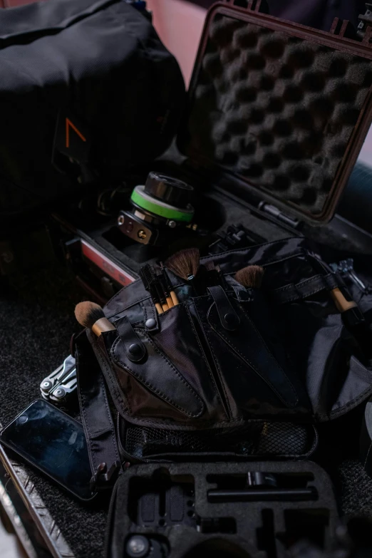 a couple of suitcases sitting on top of a floor, looking down on the camera, during the night, marmoset toolbag, inside of a car