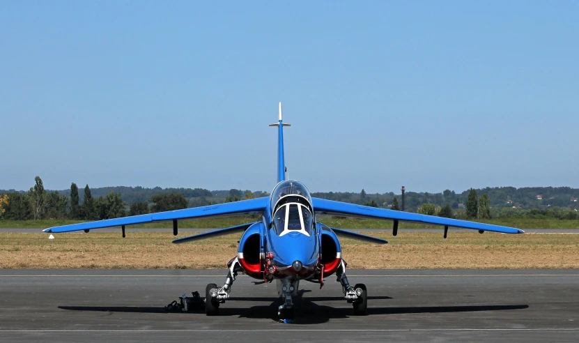 a blue jet sitting on top of an airport runway, pexels contest winner, the blue panther, red and blue, ready to model, phantom