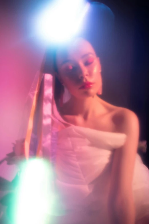 a woman in a white dress posing for a picture, an album cover, inspired by Gao Cen, pexels contest winner, holography, she looks like a mix of grimes, dramatic pink light, lily collins, fashion color studio lighting