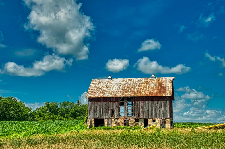 an old barn sitting in the middle of a field, pixabay contest winner, renaissance, on a bright day, high resolution photo, old american midwest, instagram photo