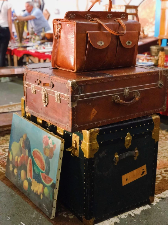 a pile of luggage sitting on top of each other, furniture and decor, thumbnail, vintage clothing, various artworks