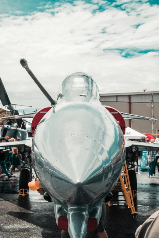 a fighter jet sitting on top of an airport tarmac, pexels contest winner, festivals, profile image, shiny silver, instagram picture