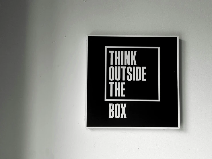 a black and white sign that says think outside the box, a poster, by Maria van Oosterwijk, lightbox, 1 6 x 1 6, business, outdoor
