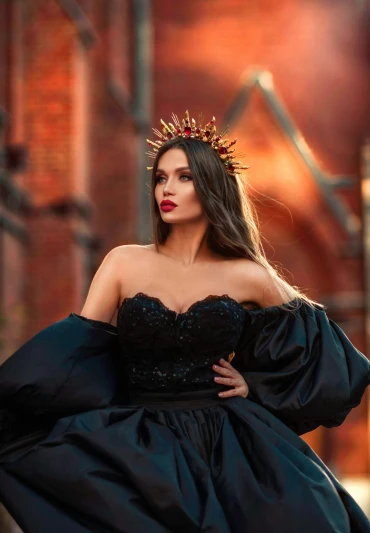 a woman in a black dress with a crown on her head, by Zofia Stryjenska, pexels contest winner, instagram model, square, expensive voluminous dress, ukraine. professional photo